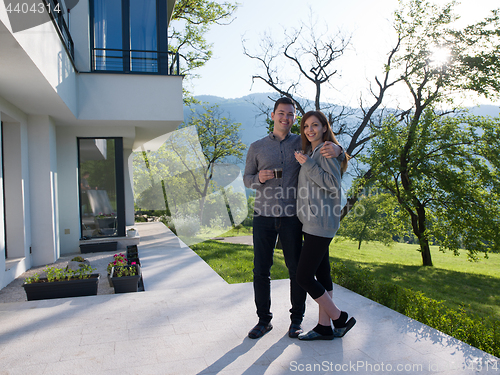 Image of couple enjoying morning coffee