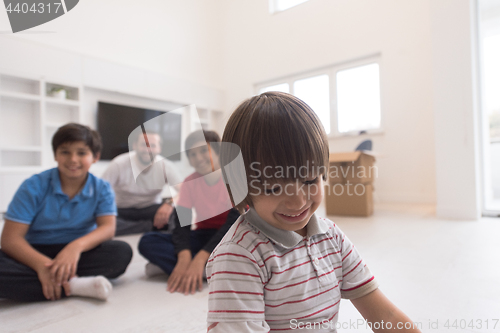 Image of portrait of happy young boys with their dad