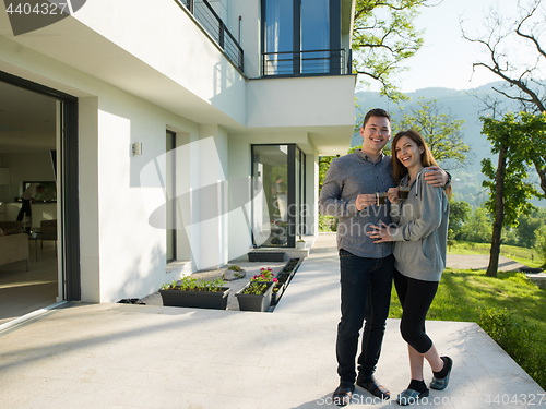 Image of couple enjoying morning coffee