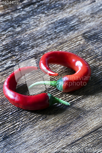 Image of Two red chili peppers 