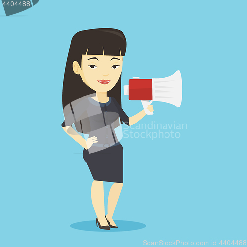 Image of Business woman speaking into megaphone.