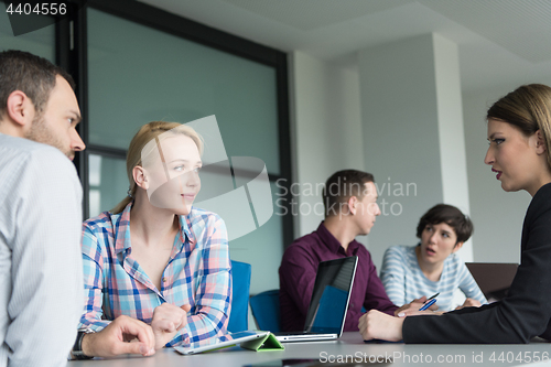 Image of Business Team At A Meeting at modern office building