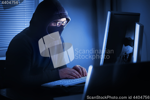 Image of Hacker at computer