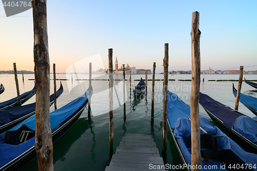 Image of Condolas and wooden pier