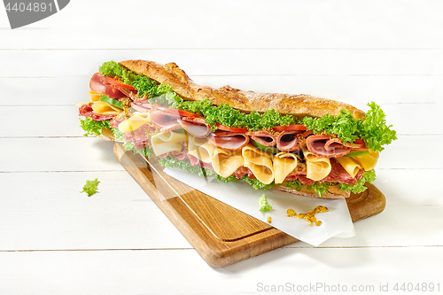 Image of Tasty hamburger, beef burger in close-up on a plate and on white background.