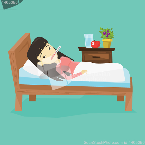 Image of Sick woman with thermometer laying in bed.