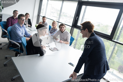 Image of Group of young people meeting in startup office