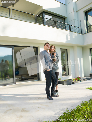 Image of couple enjoying morning coffee