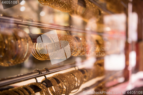 Image of gold jewelry in the shop window