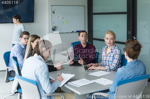 Image of Business Team At A Meeting at modern office building