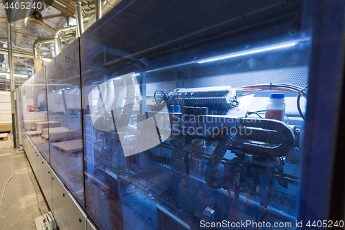 Image of machine at woodworking plant shop