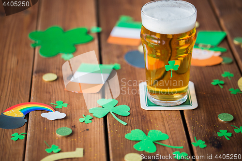 Image of glass of beer and st patricks day decorations