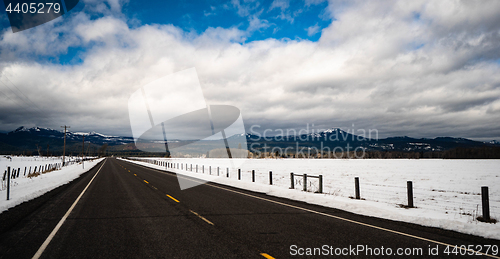 Image of Long Panoramic Composition Open Road Two Lane Highway Winter Sea