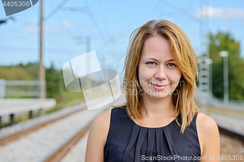 Image of Portrait of girl near railway path