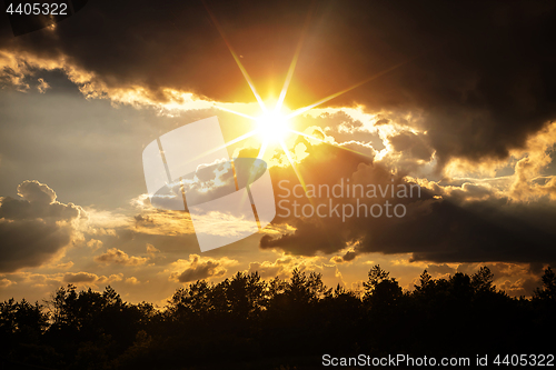 Image of sunset with dark clouds 