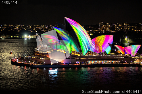 Image of Sydney Opera House illuminated with beautiful vibrant multi colo