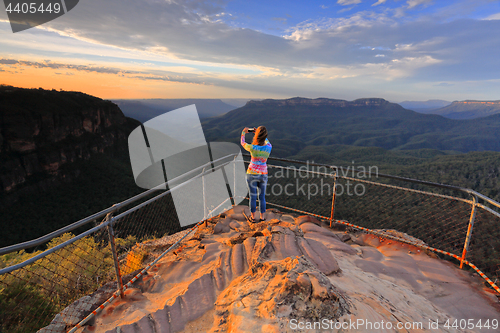 Image of Capturing a photo of sunrise mountain lookout