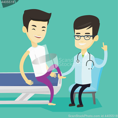 Image of Gym doctor checking ankle of a patient.