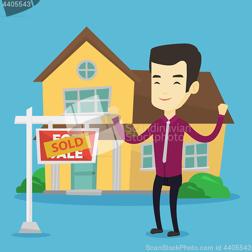 Image of Real estate agent with sold placard.