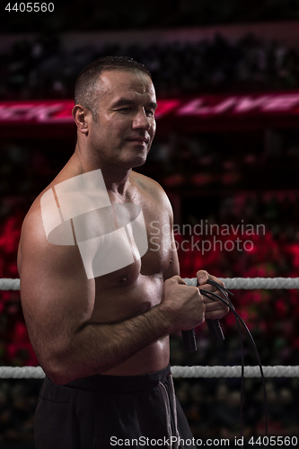 Image of professional kickboxer in the training ring