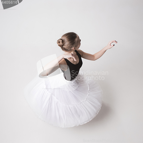 Image of The top view of the teen ballerina on white background