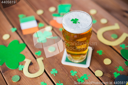 Image of glass of beer and st patricks day decorations