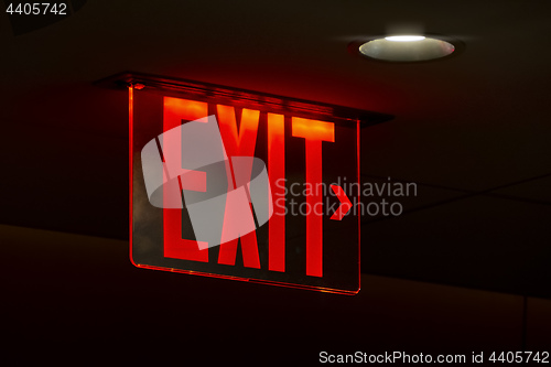 Image of a red lit exit sign