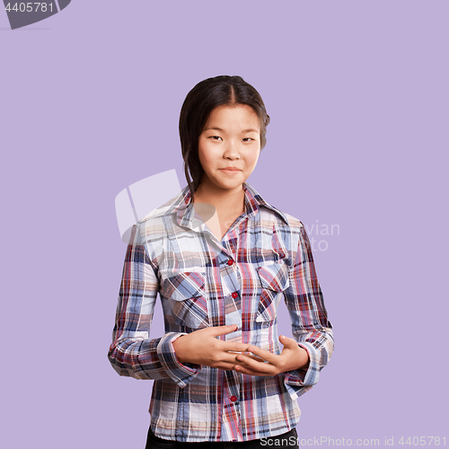 Image of Asian girl shows well done with both hands