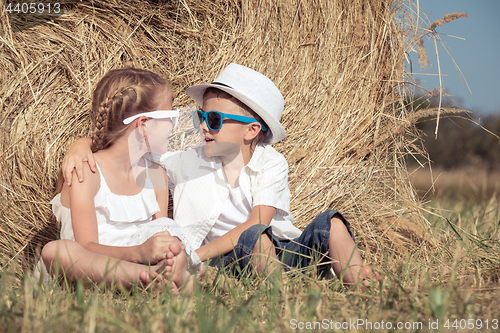 Image of Happy children playing in the park at the day time.