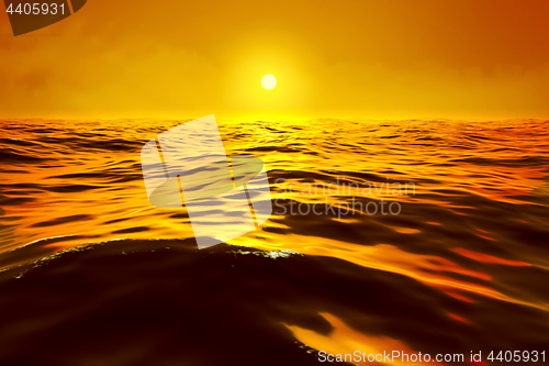 Image of a golden sunset over the ocean