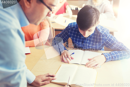 Image of group of students and teacher at school classroom