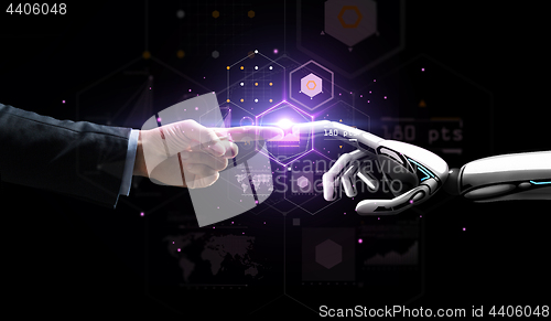 Image of robot and human hand over virtual projection