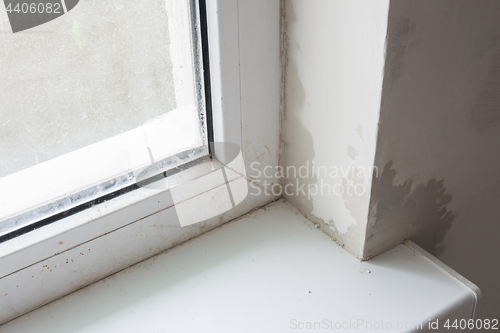 Image of Poor installation of plastic windows, condensation and streaks on the slopes