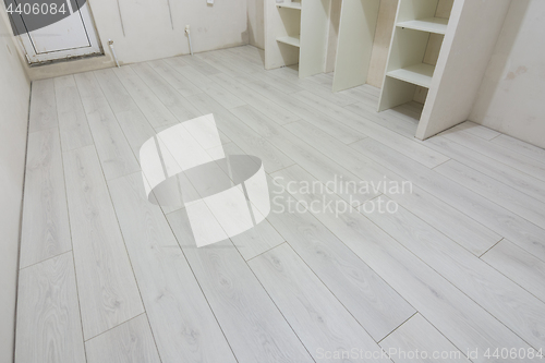 Image of Bright laminate is laid in a renovated residential building