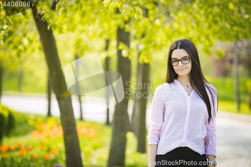 Image of Teenager girl looking at camera and smiling