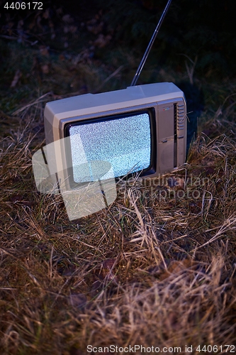 Image of TV no signal in grass