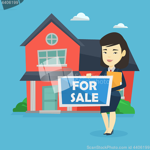 Image of Young female realtor offering house.