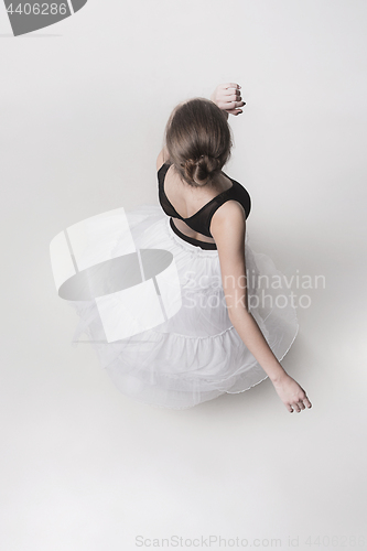 Image of The top view of the teen ballerina on white background