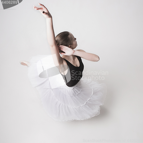 Image of The top view of the teen ballerina on white background