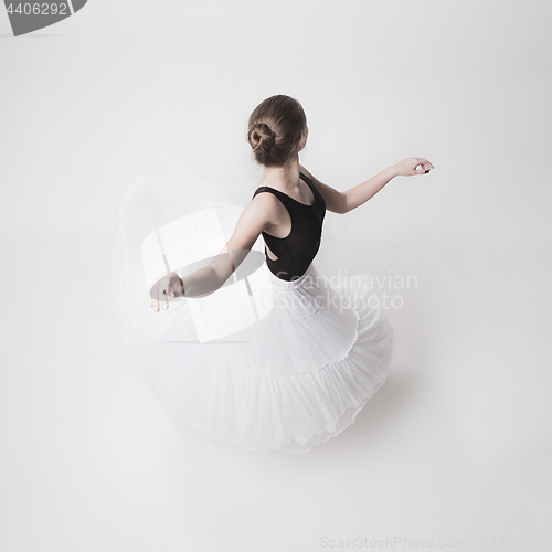 Image of The top view of the teen ballerina on white background