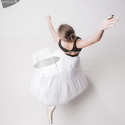 Image of The top view of the teen ballerina on white background