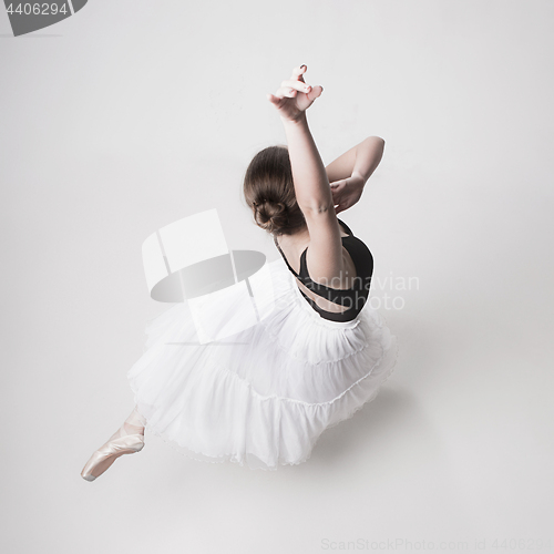 Image of The top view of the teen ballerina on white background