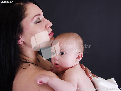 Image of Mother holding Child