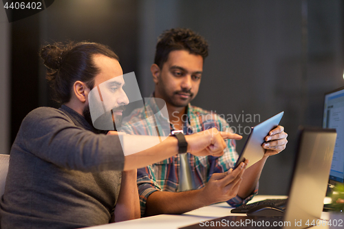 Image of creative team with tablet pc working at office