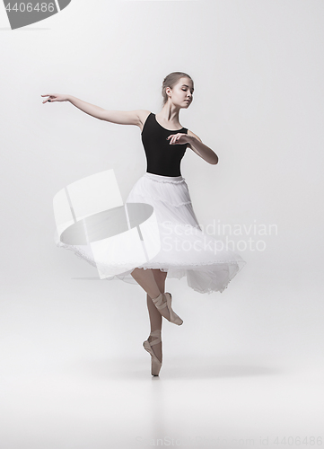 Image of Young classical dancer isolated on white background.