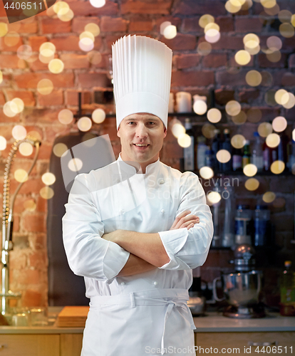 Image of happy male chef cook in restaurant kitchen