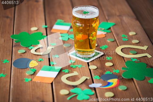 Image of glass of beer and st patricks day decorations