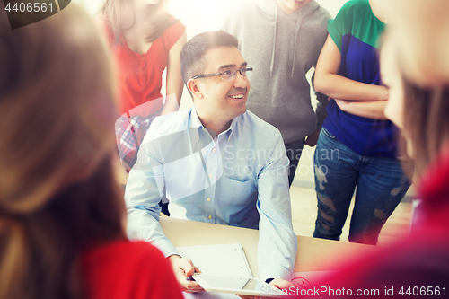 Image of group of students and teacher at school classroom