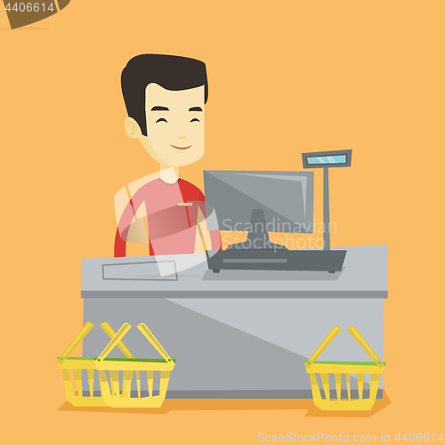 Image of Cashier standing at the checkout in supermarket.