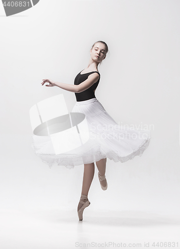 Image of Young classical dancer isolated on white background.